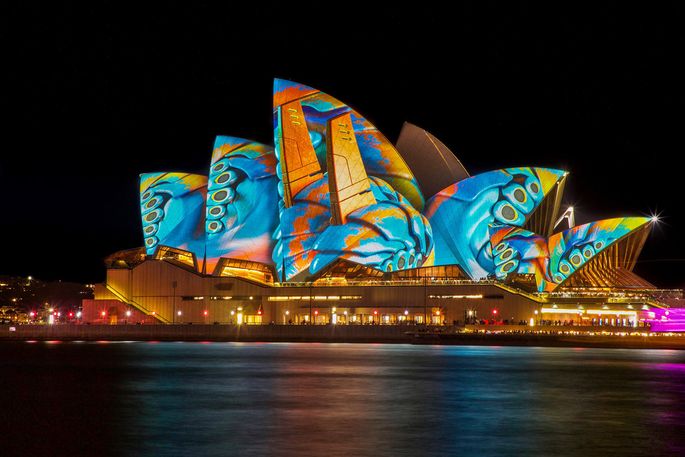 Sydney Opera House with colorful projections at night