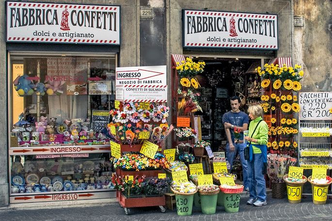 people shopping at an Italian candy store