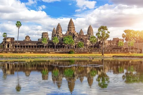 Angkor Wat set against a clouded blue sky in cambodia