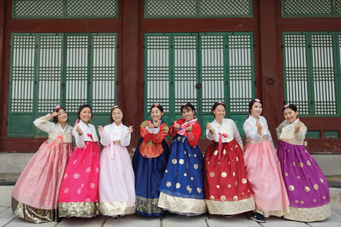 A group of women wearing brightly colored Korean hanbok